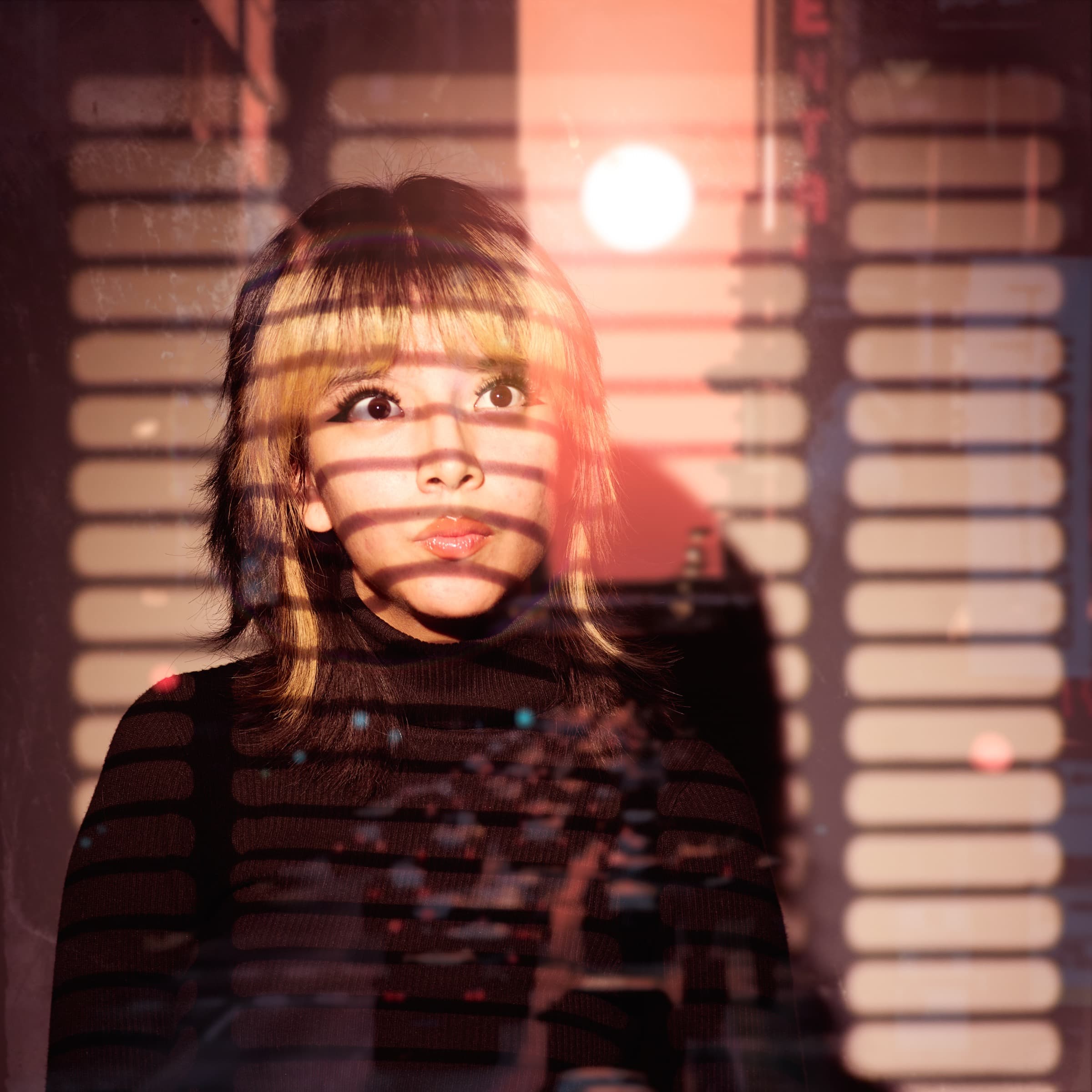 Multi-exposure window portrait, downtown
