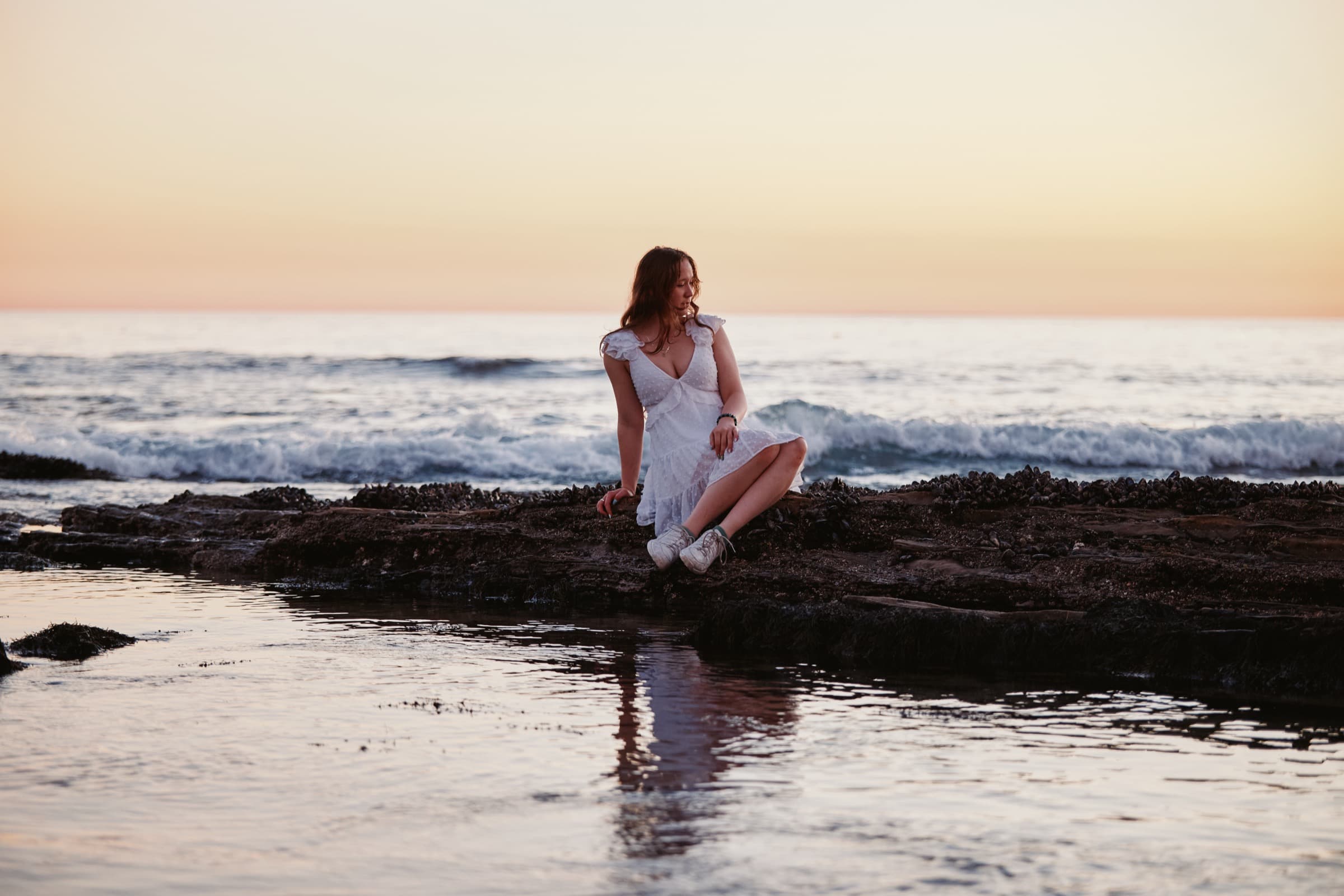 Portrait by the tide pool, sunset reflection